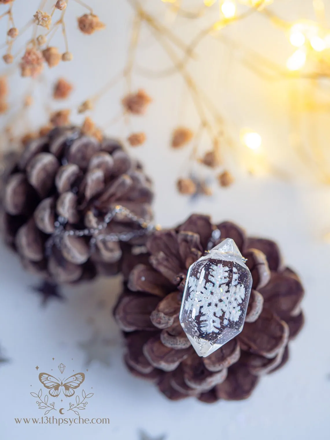 Encased snowflake crystal point pendant necklace